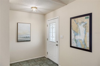 Escape to this Gulf access haven, with prime waterfront on Deep Creek Golf Club in Florida - for sale on GolfHomes.com, golf home, golf lot