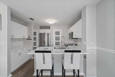 Sweeping, tranquil views set the tone for this beautifully on Estero Country Club in Florida - for sale on GolfHomes.com, golf home, golf lot