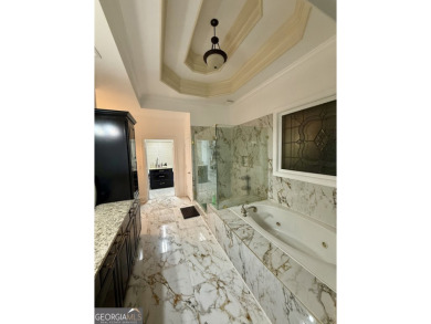 Welcome Home to Luxury Living with Stunning Golf Course Views! on Canongate At Heron Bay in Georgia - for sale on GolfHomes.com, golf home, golf lot