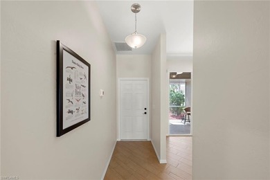 Enjoy peaceful lake and golf course views from this beautifully on Stoneybrook Golf Club in Florida - for sale on GolfHomes.com, golf home, golf lot