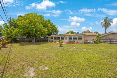 Welcome to your dream home! This beautifully updated 3 bedroom on Largo Golf Course in Florida - for sale on GolfHomes.com, golf home, golf lot