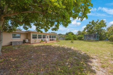 Welcome to your dream home! This beautifully updated 3 bedroom on Largo Golf Course in Florida - for sale on GolfHomes.com, golf home, golf lot