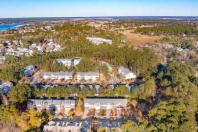 Welcome to 117 Fresh Meadow Lane, a stunning end-unit condo in on Dunes West Golf Club in South Carolina - for sale on GolfHomes.com, golf home, golf lot