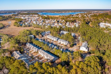 Welcome to 117 Fresh Meadow Lane, a stunning end-unit condo in on Dunes West Golf Club in South Carolina - for sale on GolfHomes.com, golf home, golf lot