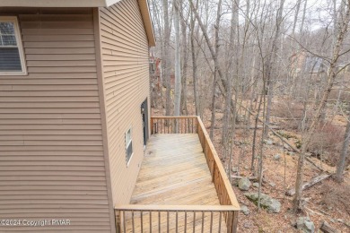 MODERN 3-LEVEL CONTEMPORARY Totally Renovated & Fully Furnished on Pocono Farms Country Club in Pennsylvania - for sale on GolfHomes.com, golf home, golf lot