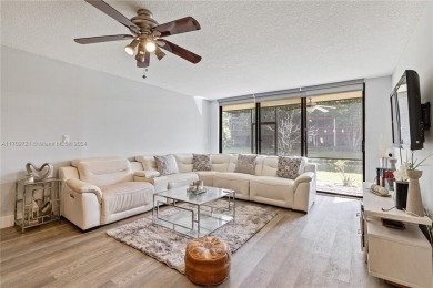 WELCOME TO THIS UPDATED AND SPACIOUS 2/2 CONDO LOCATED IN THE on Jacaranda Golf Club in Florida - for sale on GolfHomes.com, golf home, golf lot