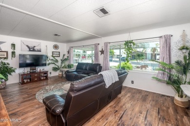This charming and well-maintained, recently updated 2-bedroom on Fountain of the Sun Country Club in Arizona - for sale on GolfHomes.com, golf home, golf lot