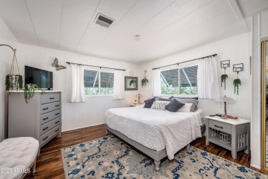 This charming and well-maintained, recently updated 2-bedroom on Fountain of the Sun Country Club in Arizona - for sale on GolfHomes.com, golf home, golf lot