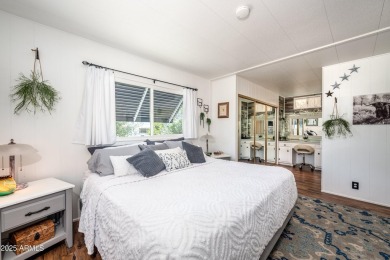 This charming and well-maintained, recently updated 2-bedroom on Fountain of the Sun Country Club in Arizona - for sale on GolfHomes.com, golf home, golf lot