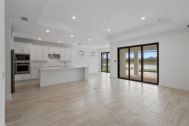 Welcome to this stunning 2024 PRESTIGE floor plan home located on Panther Run Golf Club in Florida - for sale on GolfHomes.com, golf home, golf lot