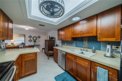 This is an exceptional condo! You need to see this one to on Falcon Watch Golf Club in Florida - for sale on GolfHomes.com, golf home, golf lot