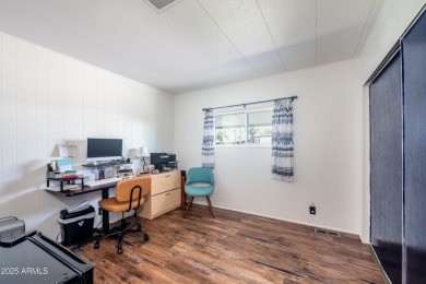 This charming and well-maintained, recently updated 2-bedroom on Fountain of the Sun Country Club in Arizona - for sale on GolfHomes.com, golf home, golf lot