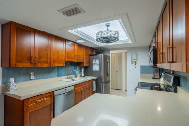 This is an exceptional condo! You need to see this one to on Falcon Watch Golf Club in Florida - for sale on GolfHomes.com, golf home, golf lot