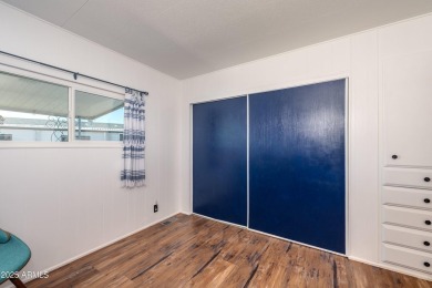 This charming and well-maintained, recently updated 2-bedroom on Fountain of the Sun Country Club in Arizona - for sale on GolfHomes.com, golf home, golf lot