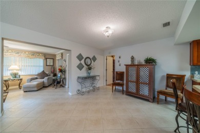 This is an exceptional condo! You need to see this one to on Falcon Watch Golf Club in Florida - for sale on GolfHomes.com, golf home, golf lot