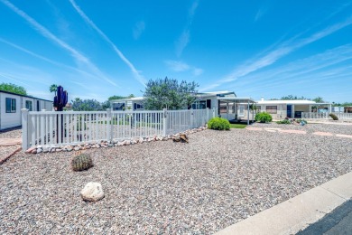 This charming and well-maintained, recently updated 2-bedroom on Fountain of the Sun Country Club in Arizona - for sale on GolfHomes.com, golf home, golf lot