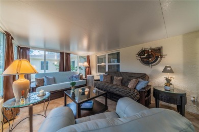 This is an exceptional condo! You need to see this one to on Falcon Watch Golf Club in Florida - for sale on GolfHomes.com, golf home, golf lot
