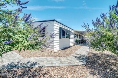 This charming and well-maintained, recently updated 2-bedroom on Fountain of the Sun Country Club in Arizona - for sale on GolfHomes.com, golf home, golf lot