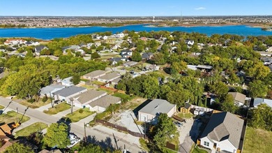 This listing includes two lots - 4529 & 4531 W Lake Highlands on Stewart Peninsula Golf Course in Texas - for sale on GolfHomes.com, golf home, golf lot