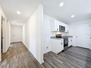 Why wait to build, when you can buy ready and new! Minutes away on The Oaks Golf Club in Florida - for sale on GolfHomes.com, golf home, golf lot