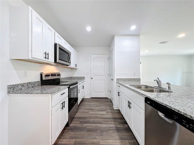 Why wait to build, when you can buy ready and new! Minutes away on The Oaks Golf Club in Florida - for sale on GolfHomes.com, golf home, golf lot