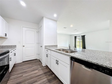 Why wait to build, when you can buy ready and new! Minutes away on The Oaks Golf Club in Florida - for sale on GolfHomes.com, golf home, golf lot