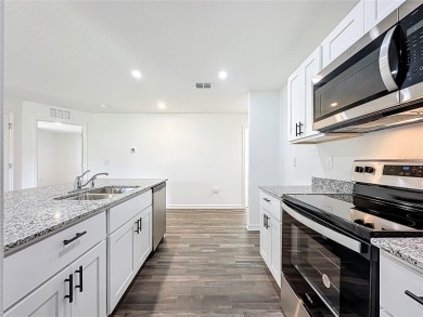 Why wait to build, when you can buy ready and new! Minutes away on The Oaks Golf Club in Florida - for sale on GolfHomes.com, golf home, golf lot