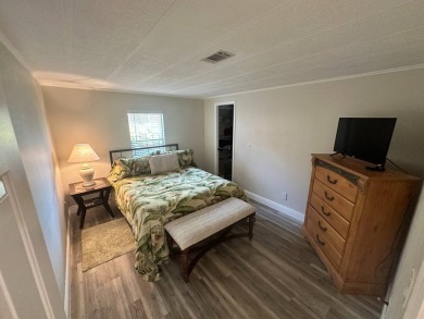 Lot Rent $1342.00    This well cared for 2 bedrooms, 2 bathrooms on Del Tura Golf and Country Club in Florida - for sale on GolfHomes.com, golf home, golf lot