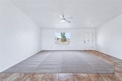 This Valle Vista home sits on nearly one-third of an acre along on Valle Vista Golf Course in Arizona - for sale on GolfHomes.com, golf home, golf lot