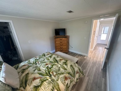 Lot Rent $1342.00    This well cared for 2 bedrooms, 2 bathrooms on Del Tura Golf and Country Club in Florida - for sale on GolfHomes.com, golf home, golf lot