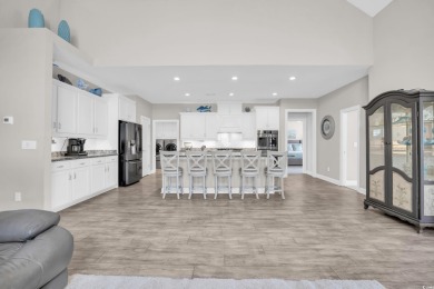 Discover this stunning 1.5-story craftsman-style home on Surf Golf and Beach Club in South Carolina - for sale on GolfHomes.com, golf home, golf lot