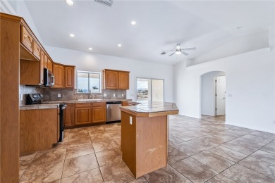 This Valle Vista home sits on nearly one-third of an acre along on Valle Vista Golf Course in Arizona - for sale on GolfHomes.com, golf home, golf lot