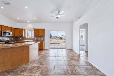 This Valle Vista home sits on nearly one-third of an acre along on Valle Vista Golf Course in Arizona - for sale on GolfHomes.com, golf home, golf lot