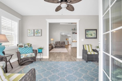 Discover this stunning 1.5-story craftsman-style home on Surf Golf and Beach Club in South Carolina - for sale on GolfHomes.com, golf home, golf lot