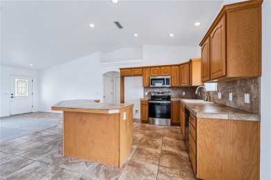 This Valle Vista home sits on nearly one-third of an acre along on Valle Vista Golf Course in Arizona - for sale on GolfHomes.com, golf home, golf lot
