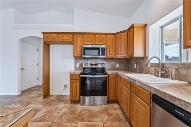 This Valle Vista home sits on nearly one-third of an acre along on Valle Vista Golf Course in Arizona - for sale on GolfHomes.com, golf home, golf lot