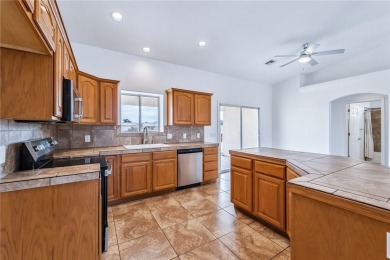This Valle Vista home sits on nearly one-third of an acre along on Valle Vista Golf Course in Arizona - for sale on GolfHomes.com, golf home, golf lot