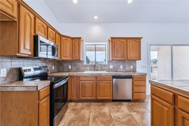 This Valle Vista home sits on nearly one-third of an acre along on Valle Vista Golf Course in Arizona - for sale on GolfHomes.com, golf home, golf lot