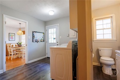 This gorgeous one-story brick ranch in desirable Wilmington Park on Wilmington Island Club in Georgia - for sale on GolfHomes.com, golf home, golf lot