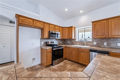 This Valle Vista home sits on nearly one-third of an acre along on Valle Vista Golf Course in Arizona - for sale on GolfHomes.com, golf home, golf lot