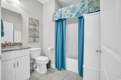 Discover this stunning 1.5-story craftsman-style home on Surf Golf and Beach Club in South Carolina - for sale on GolfHomes.com, golf home, golf lot