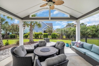 Discover this stunning 1.5-story craftsman-style home on Surf Golf and Beach Club in South Carolina - for sale on GolfHomes.com, golf home, golf lot