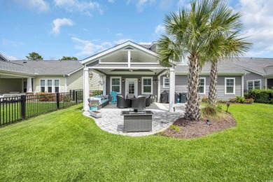 Discover this stunning 1.5-story craftsman-style home on Surf Golf and Beach Club in South Carolina - for sale on GolfHomes.com, golf home, golf lot