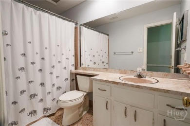 This gorgeous one-story brick ranch in desirable Wilmington Park on Wilmington Island Club in Georgia - for sale on GolfHomes.com, golf home, golf lot