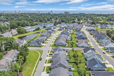 Discover this stunning 1.5-story craftsman-style home on Surf Golf and Beach Club in South Carolina - for sale on GolfHomes.com, golf home, golf lot