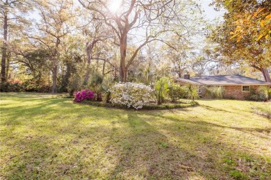 This gorgeous one-story brick ranch in desirable Wilmington Park on Wilmington Island Club in Georgia - for sale on GolfHomes.com, golf home, golf lot