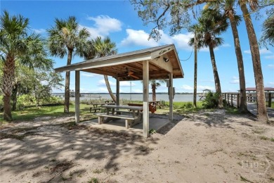 This gorgeous one-story brick ranch in desirable Wilmington Park on Wilmington Island Club in Georgia - for sale on GolfHomes.com, golf home, golf lot