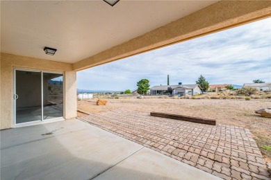 This Valle Vista home sits on nearly one-third of an acre along on Valle Vista Golf Course in Arizona - for sale on GolfHomes.com, golf home, golf lot
