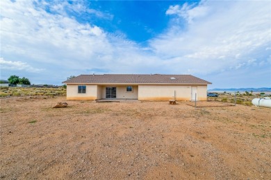This Valle Vista home sits on nearly one-third of an acre along on Valle Vista Golf Course in Arizona - for sale on GolfHomes.com, golf home, golf lot