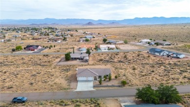 This Valle Vista home sits on nearly one-third of an acre along on Valle Vista Golf Course in Arizona - for sale on GolfHomes.com, golf home, golf lot